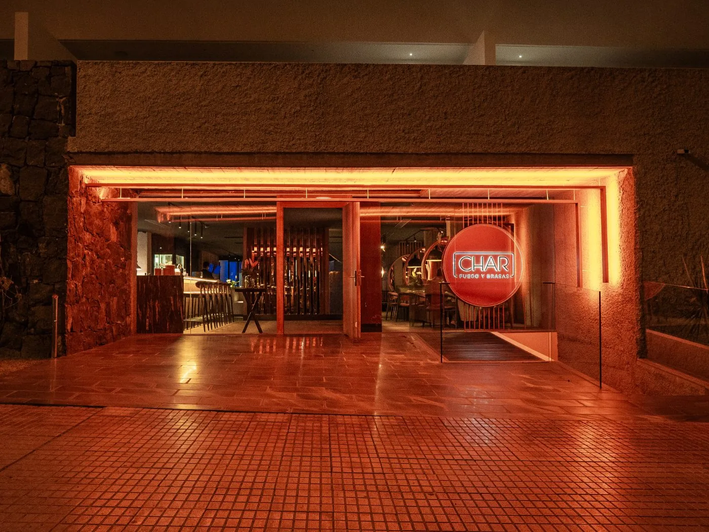 CHAR restaurant illuminated façade at night
